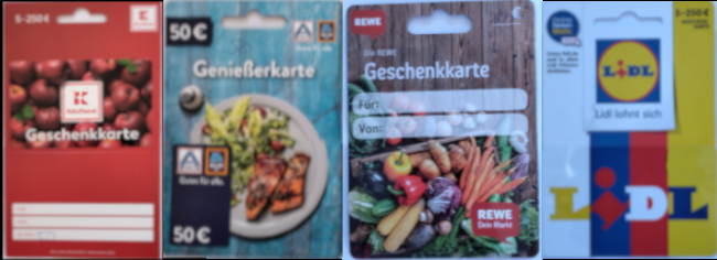 Pictures of the gift cards from the different stores. All cards are accompanied by little paper cards that hold them and also the design of the store.